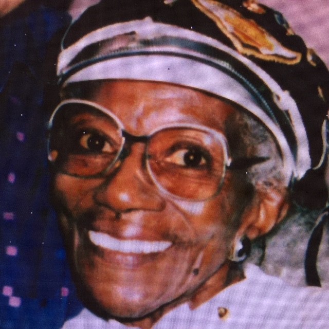 The elder Bessie Stringfield, 1990, from Ann Ferrar Collection.<br> In 2002, the author's work to preserve Bessie's story was finally rewarded when<br> Bessie was inducted posthumously to the American Motorcycle Hall of Fame. Photo is property of the author and must not be used by other parties without<br> prior written permission from Ms. Ferrar.