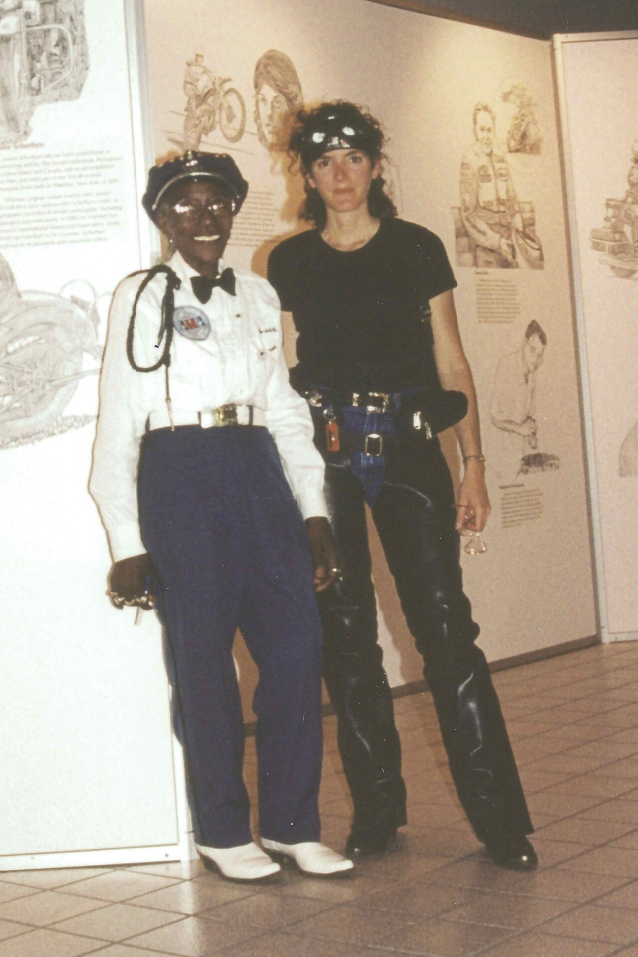 Bessie Stringfield (left) with Ann Ferrar, her biographer and friend, on the day they met in the summer of 1990. The author's coming book is <i>African American Queen of the Road: Bessie Stringfield—A Woman's Journey Through Race, Faith, Resilience and the Road </i>. Expanding on Ferrar's earlier published stories of Bessie, the book is Stringfield's definitive biography. Bessie kept this photo on top of her old box TV set in her Miami home. Ann still keeps her copy above her writing desk. Photo by Becky Brown, Founder, Women in the Wind.